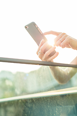 Image showing Woman using cellphone