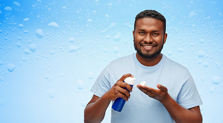 Image showing happy african american man with shaving cream