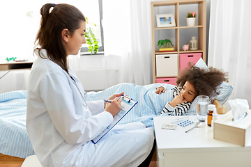 Image showing doctor with clipboard and sick girl in bed at home