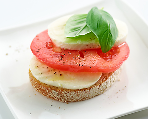 Image showing bruschetta with tomato and mozzarella