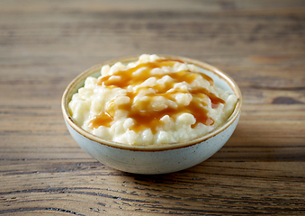 Image showing bowl of rice and milk pudding