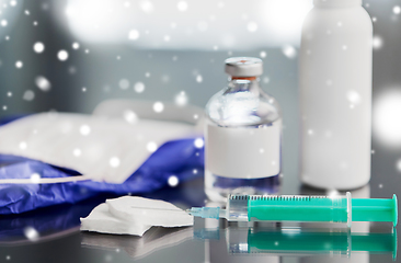 Image showing syringe, medicine, wound wipes, gloves and mask