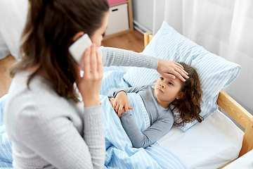 Image showing ill daughter and mother calling on phone at home