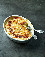 Image showing bowl of freshly baked potato gratin