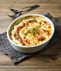 Image showing bowl of freshly baked potato gratin