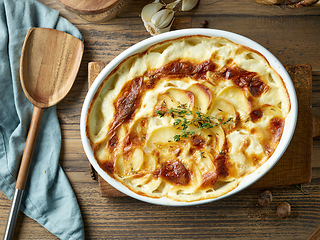 Image showing bowl of freshly baked potato gratin