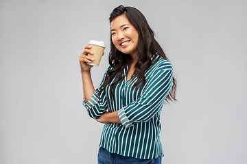 Image showing happy asian woman drinking coffee