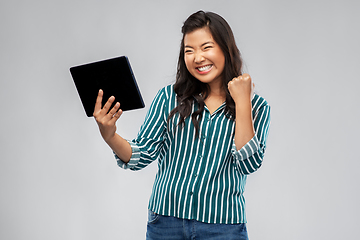 Image showing happy asian woman with tablet pc computer