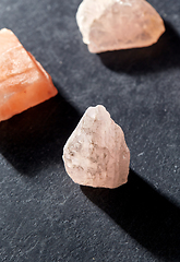 Image showing quartz crystals and gem stones on slate background