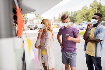 Image showing customers in masks at food truck