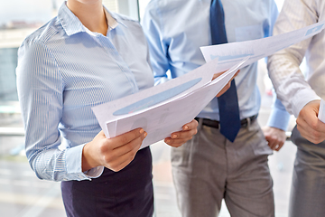 Image showing business team with papers meeting at office