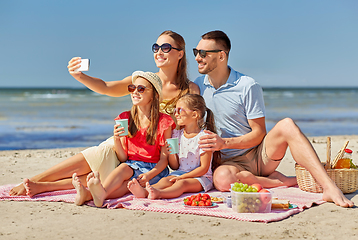 Image showing happy family taking selfie on summer beach