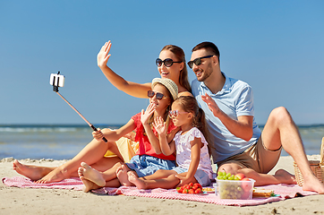 Image showing happy family taking selfie on summer beach