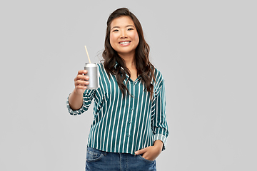 Image showing happy smiling asian woman with can drink
