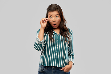 Image showing surprised asian woman in glasses or student