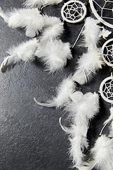 Image showing dreamcatcher on dark slate stone background