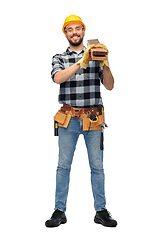 Image showing happy male worker or builder in helmet with boards