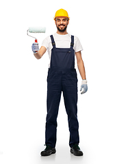 Image showing male worker or builder with paint roller
