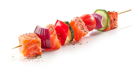 Image showing fresh raw salmon and vegetable skewer