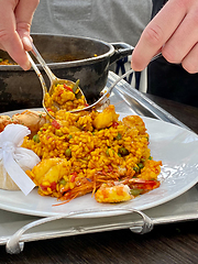 Image showing Traditional Paella serving at restaurant in Marbella, Spain