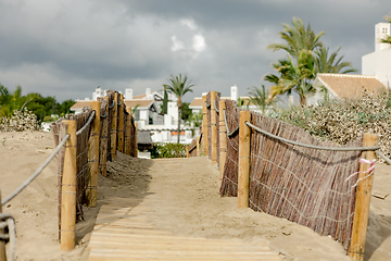 Image showing backyard gate to Marbella beach