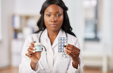 Image showing african american doctor with medicine at hospital