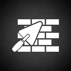 Image showing Icon of brick wall with trowel