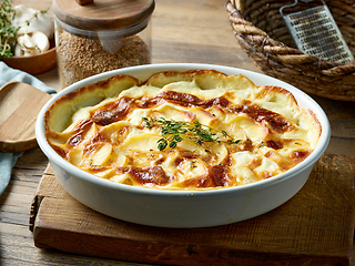 Image showing bowl of freshly baked potato gratin