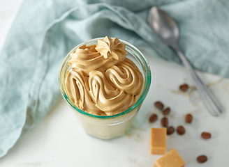 Image showing glass of whipped coffee and caramel mousse cream