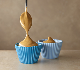 Image showing process of making coffe and caramel mousse dessert