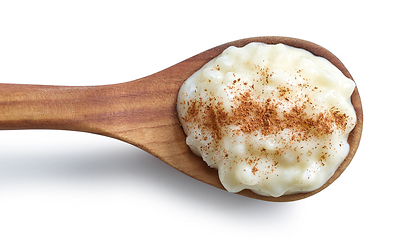 Image showing wooden spoon of rice pudding