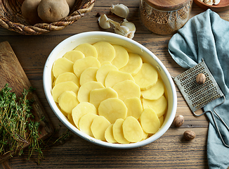 Image showing process of making potato gratin