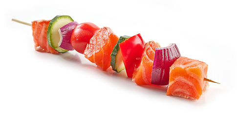 Image showing fresh raw salmon and vegetable skewer