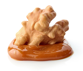 Image showing walnut in melted caramel