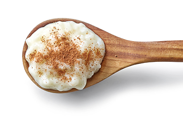 Image showing wooden spoon of rice pudding