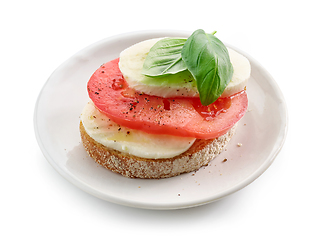 Image showing bruschetta with tomato and buffalo mozzarella