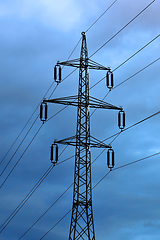 Image showing High voltage tower against the evening cloudy sky