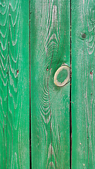 Image showing Texture of weathered wooden green painted fence