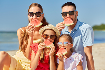 Image showing happy family having picnic on summer beach