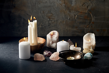 Image showing burning candles and crystals for magic ritual