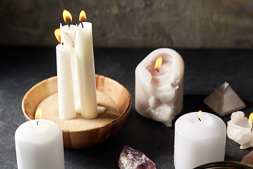 Image showing burning candles and crystals for magic ritual