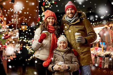 Image showing family with takeaway drinks at christmas market