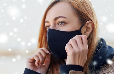 Image showing woman wearing protective reusable barrier mask