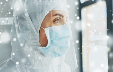 Image showing doctor in protective wear, mask and face shield