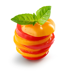 Image showing stack of red and yellow tomato slices