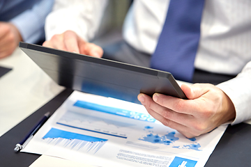 Image showing businessman with tablet pc computer at office