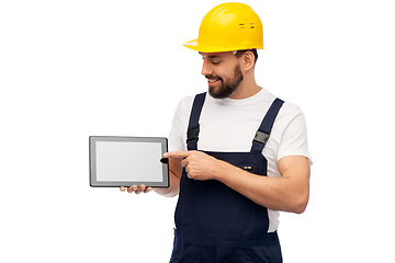 Image showing happy male worker or builder with tablet computer