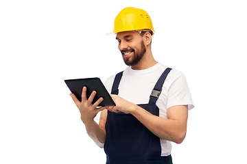 Image showing happy male worker or builder with tablet computer