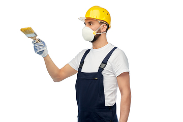 Image showing worker or builder in respirator with brush