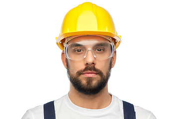 Image showing male worker or builder in helmet and overall
